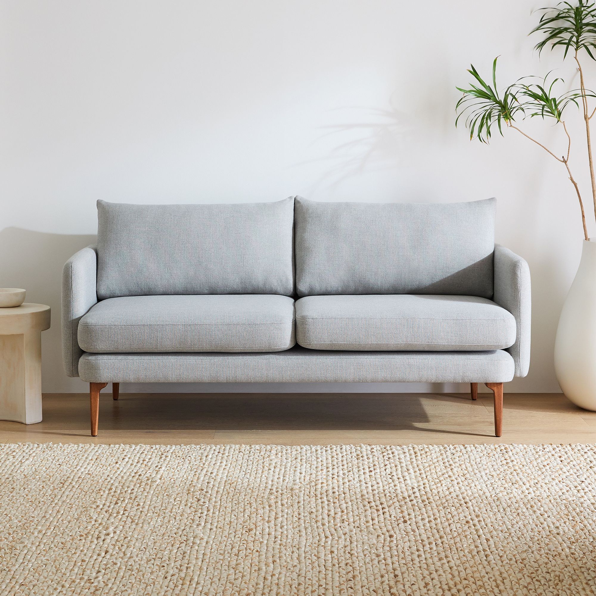 West Elm Auburn loveseat in a compact living room