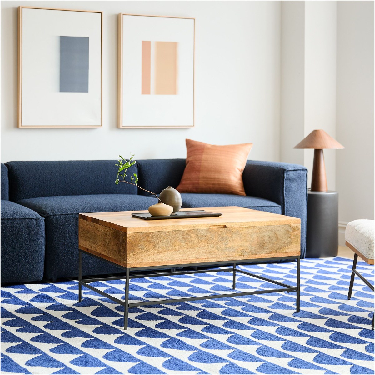 West Elm Industrial Storage Pop-Up Coffee Table — mango wood top with blackened steel legs